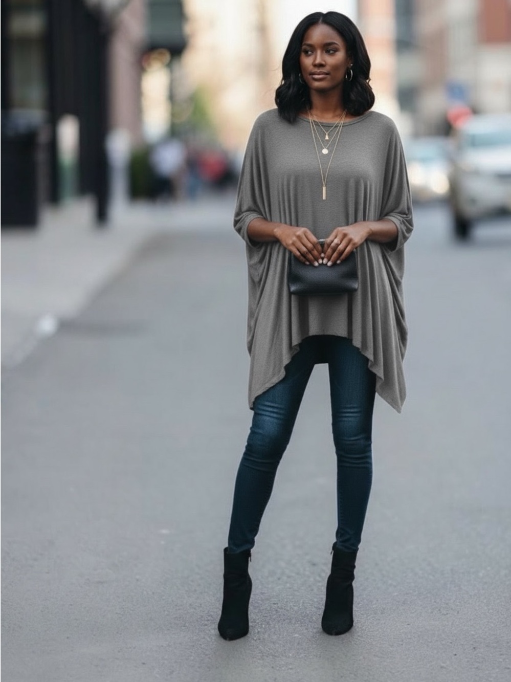Jella C. S grey scoop neck 3/4 length sleeve shark‎ bite hem flowing knit top